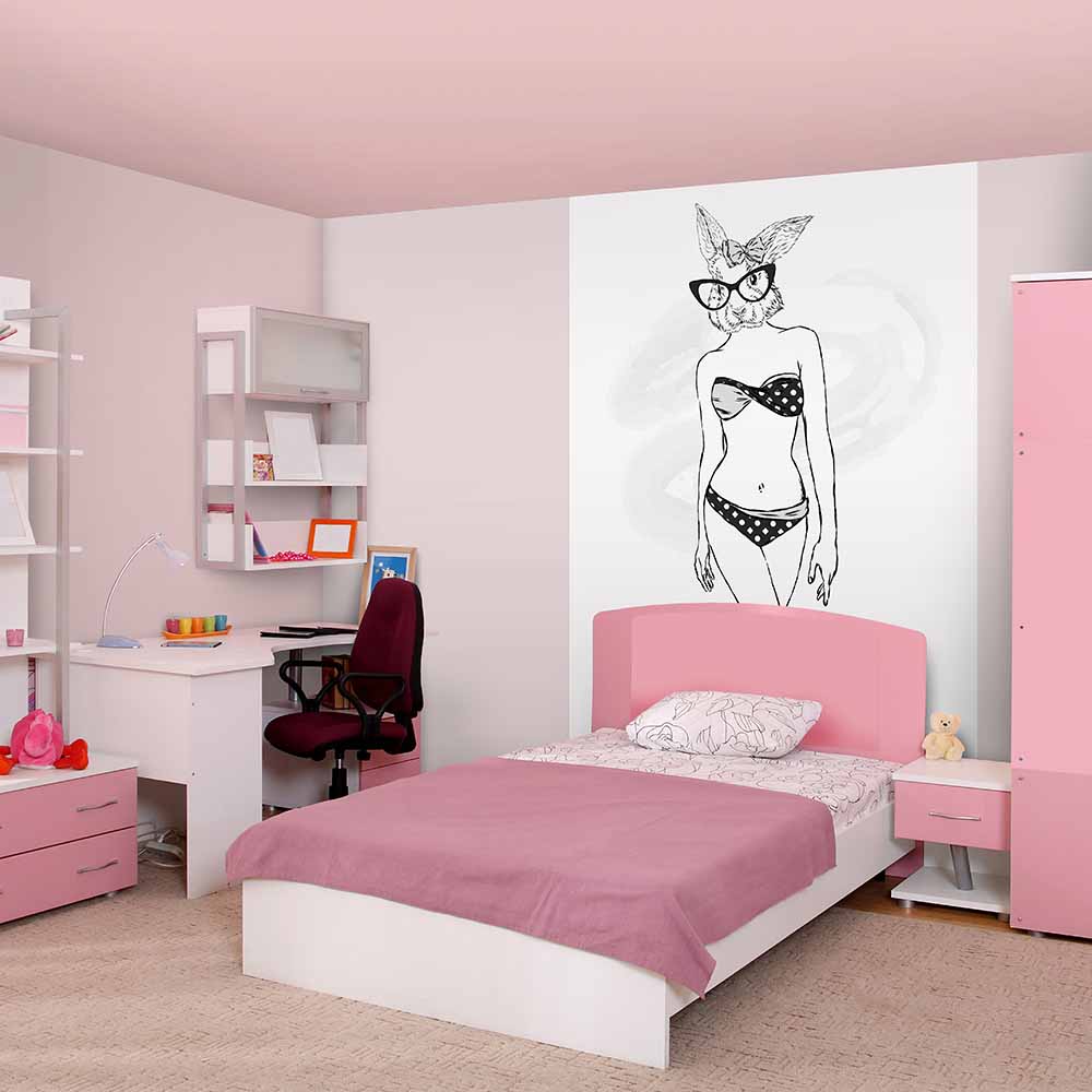 Stylish bunny-themed wall art in a pink girls' bedroom.