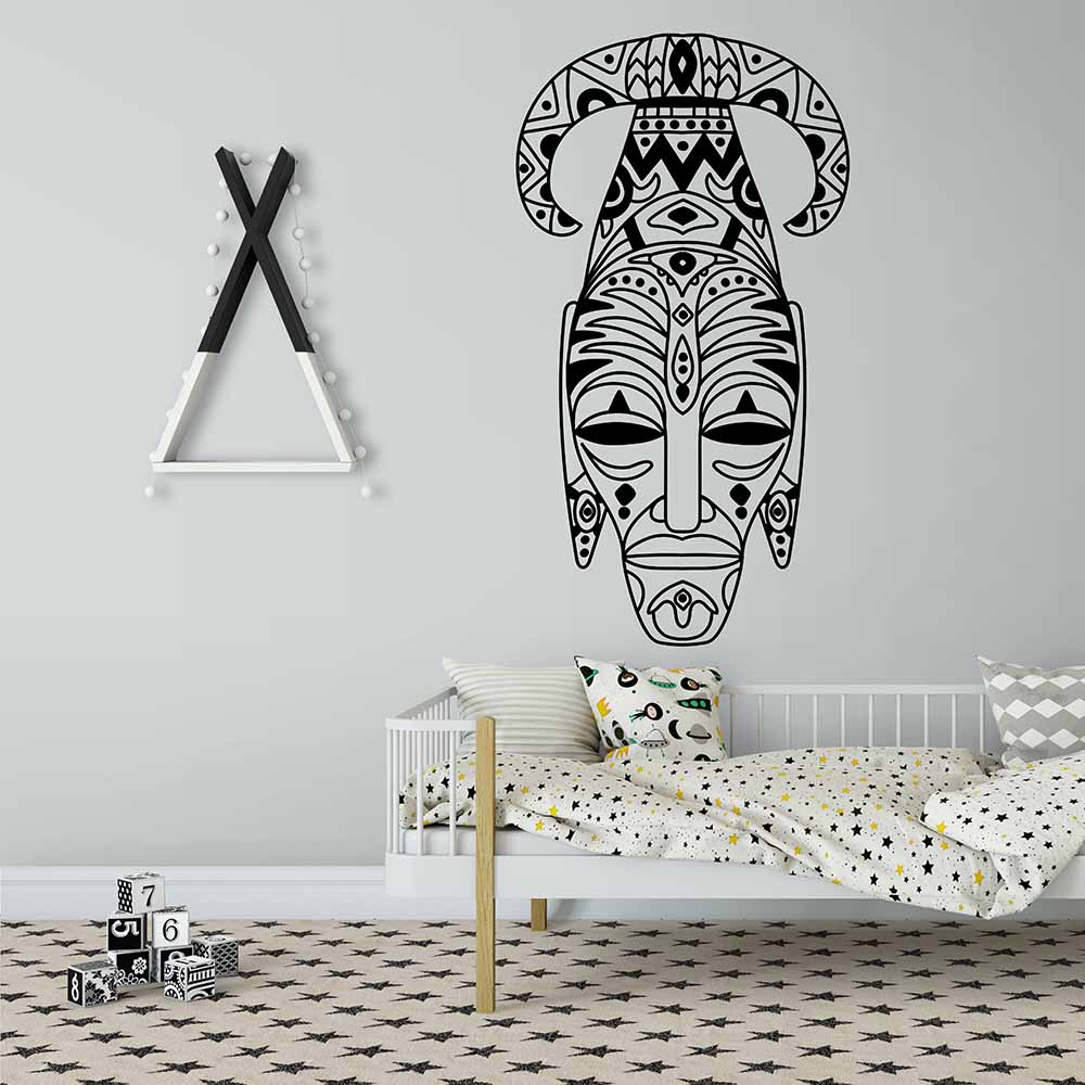 Unique tribal-themed wallpaper design in a kids' bedroom.