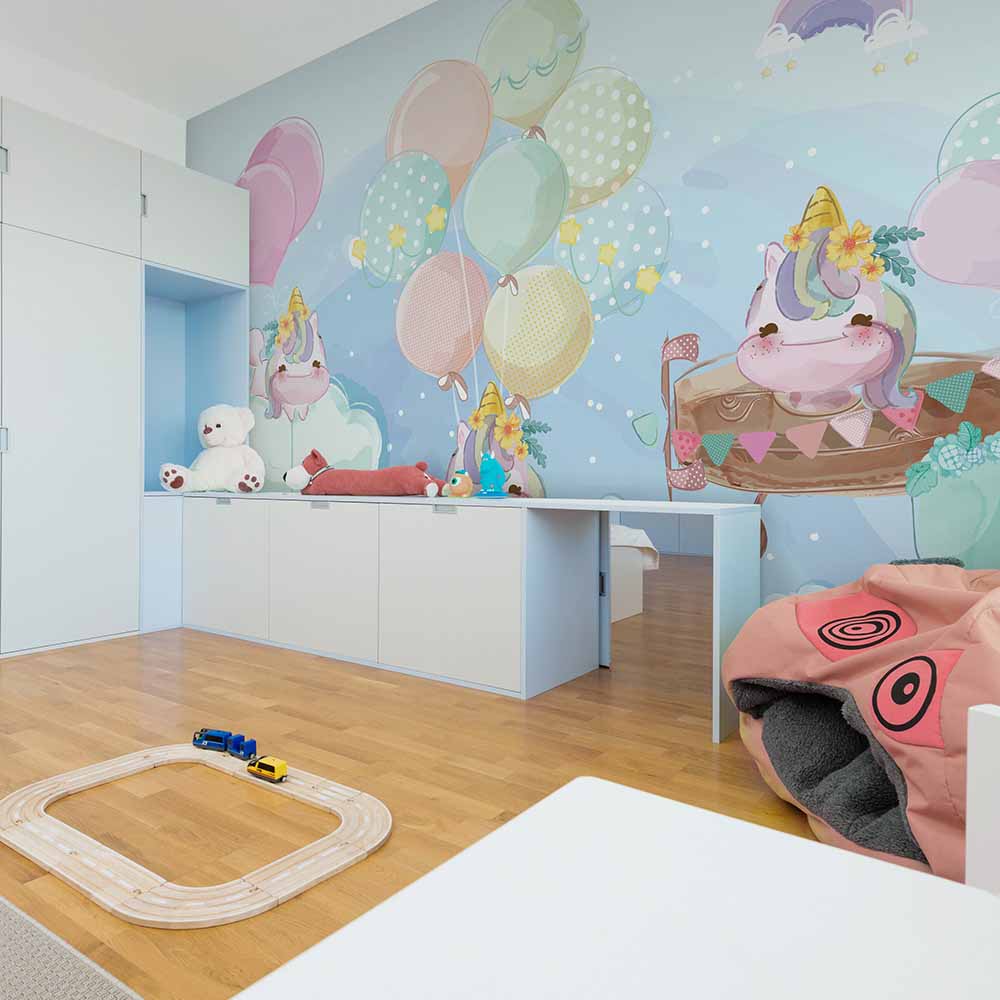 Unicorn wallpaper creates a magical playroom setting.