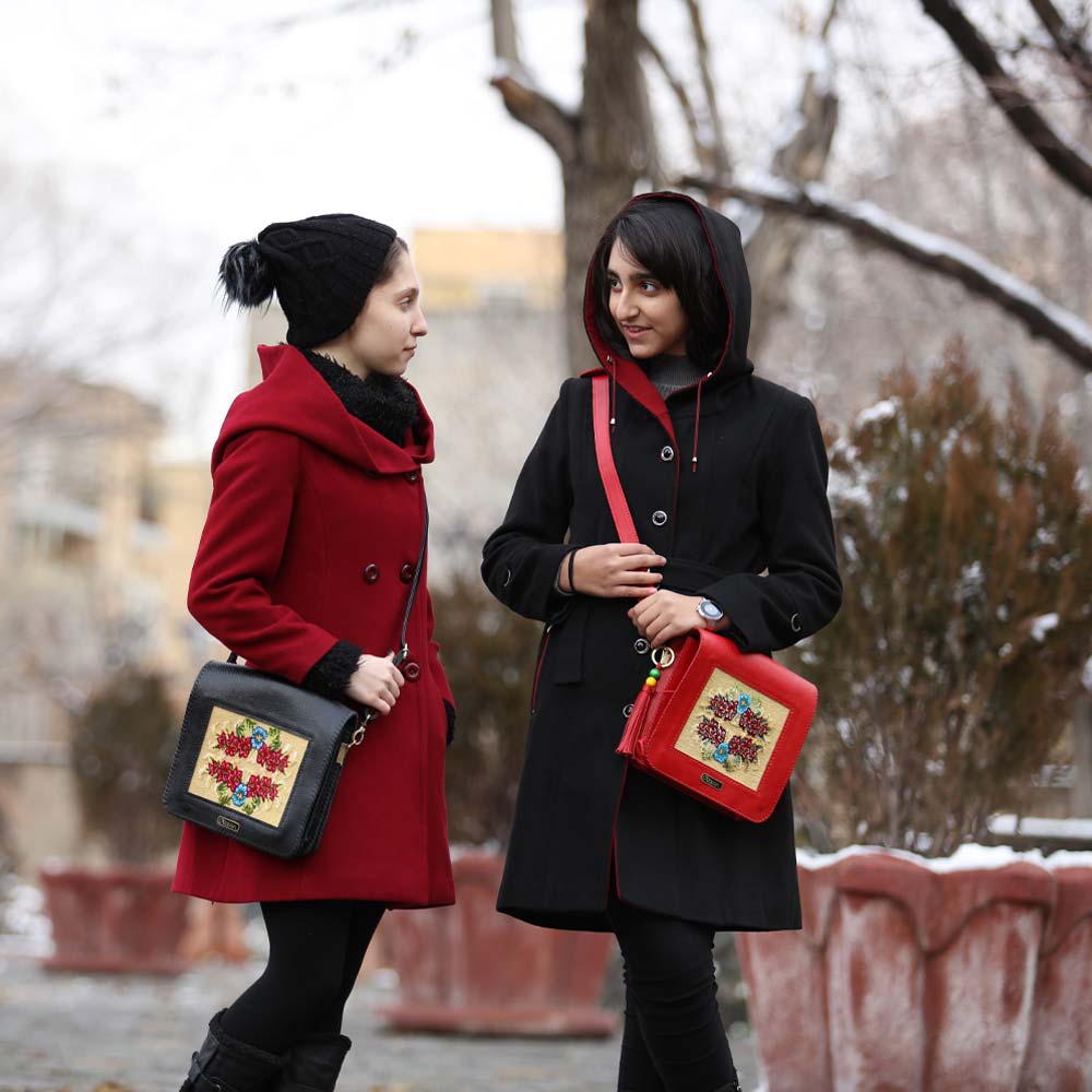 Two Women Showcasing Negar Handmade Bags.