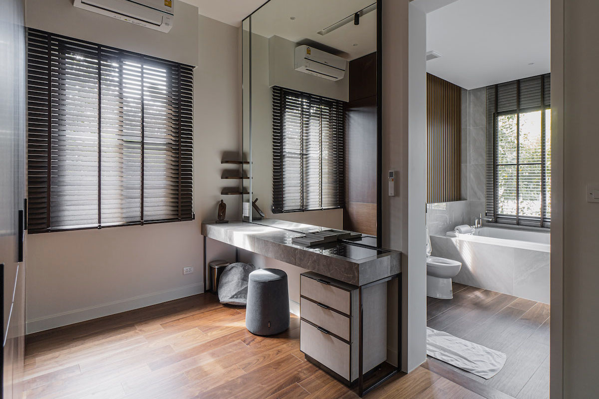 Chic Bathroom with Wooden Blinds and Natural Light.