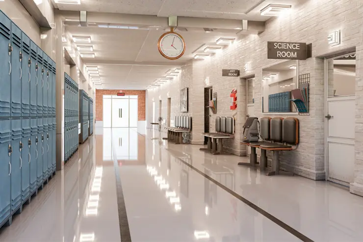 College hallway with numerous lockers and doors leading to rooms like science and art.