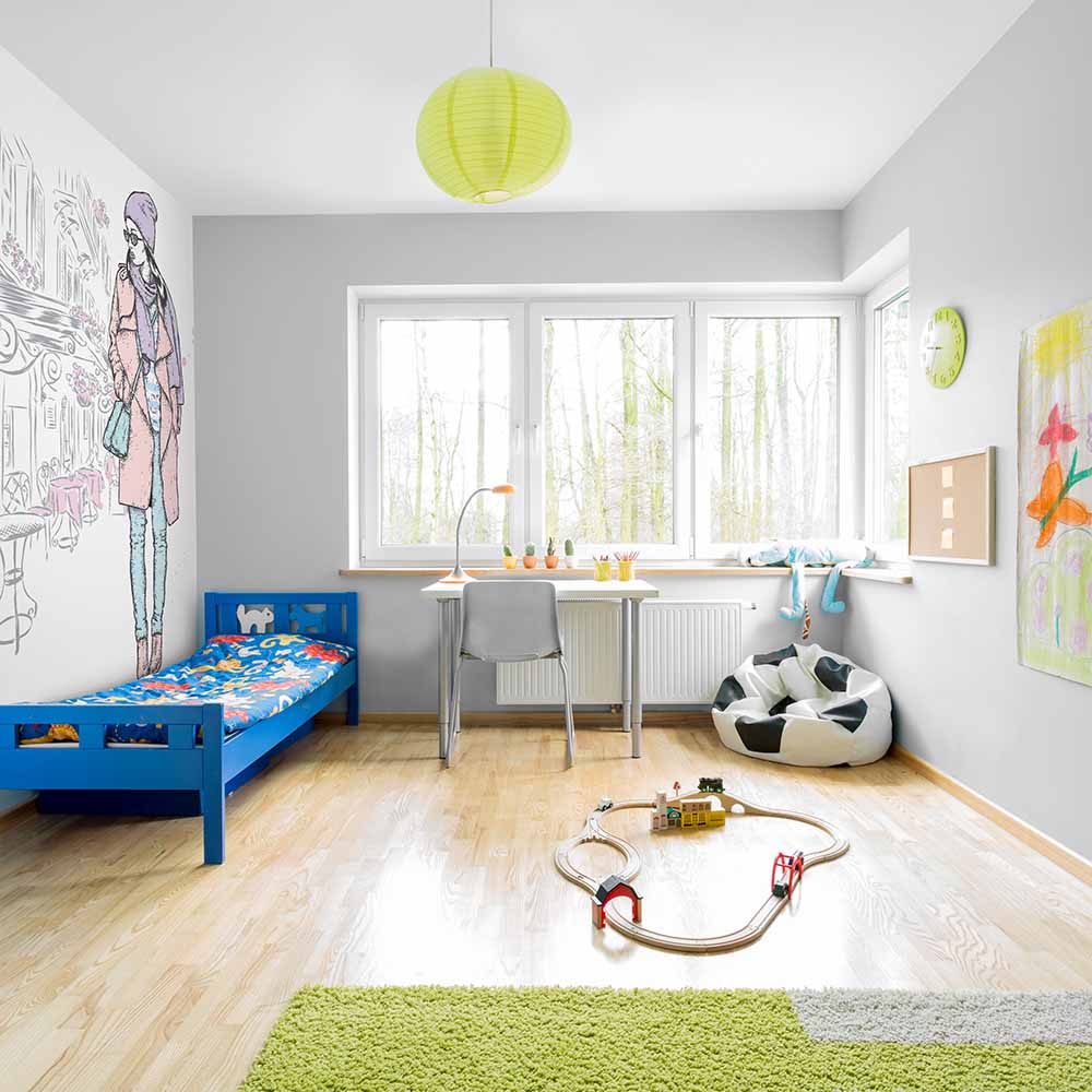 Stylish character-themed wallpaper in a kid's bedroom.
