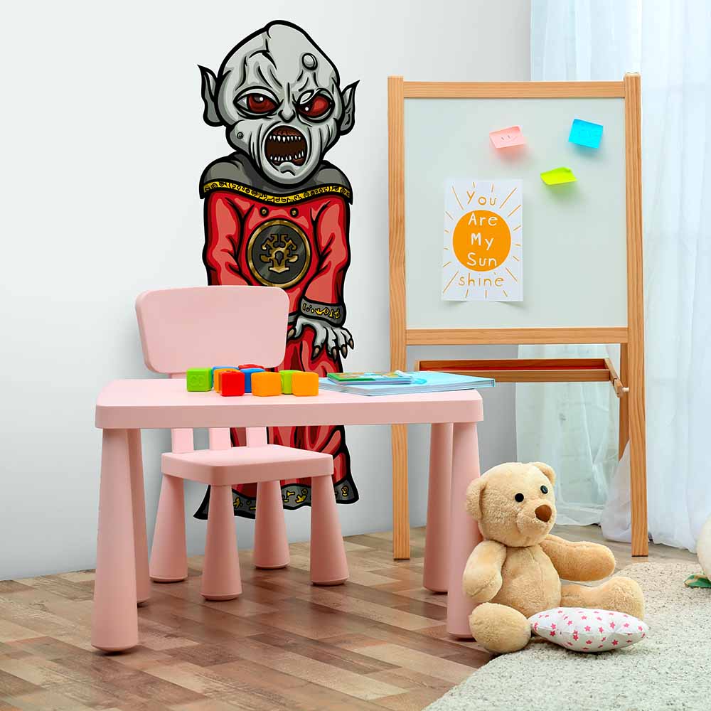 Fun and bold monster-themed wallpaper in a kids' play area.