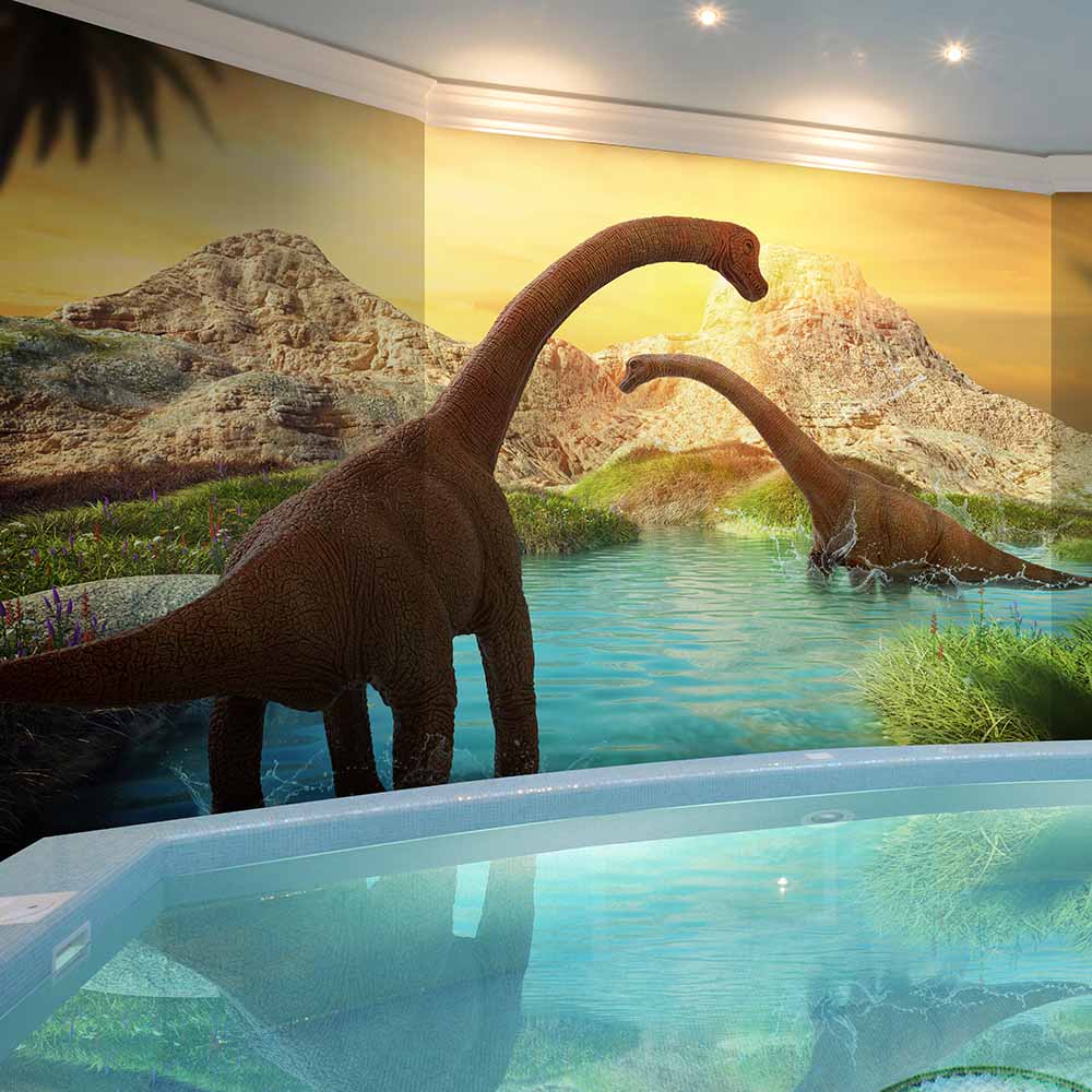 Brachiosaurus enjoying a tranquil water scene at sunset.