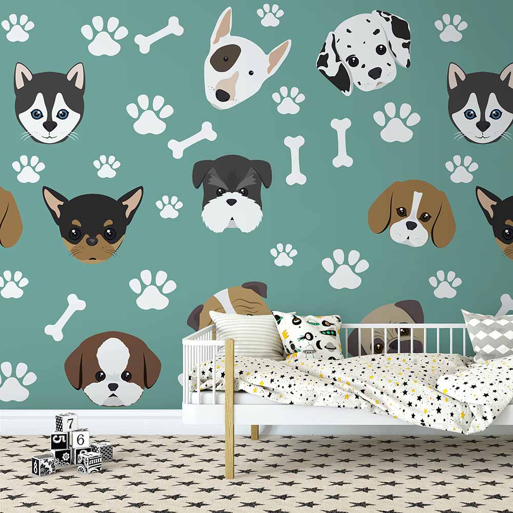 Cartoon dog faces and paw prints on teal wallpaper for kids.