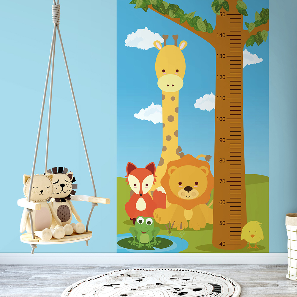 Animal-themed growth chart wallpaper for kids' room.