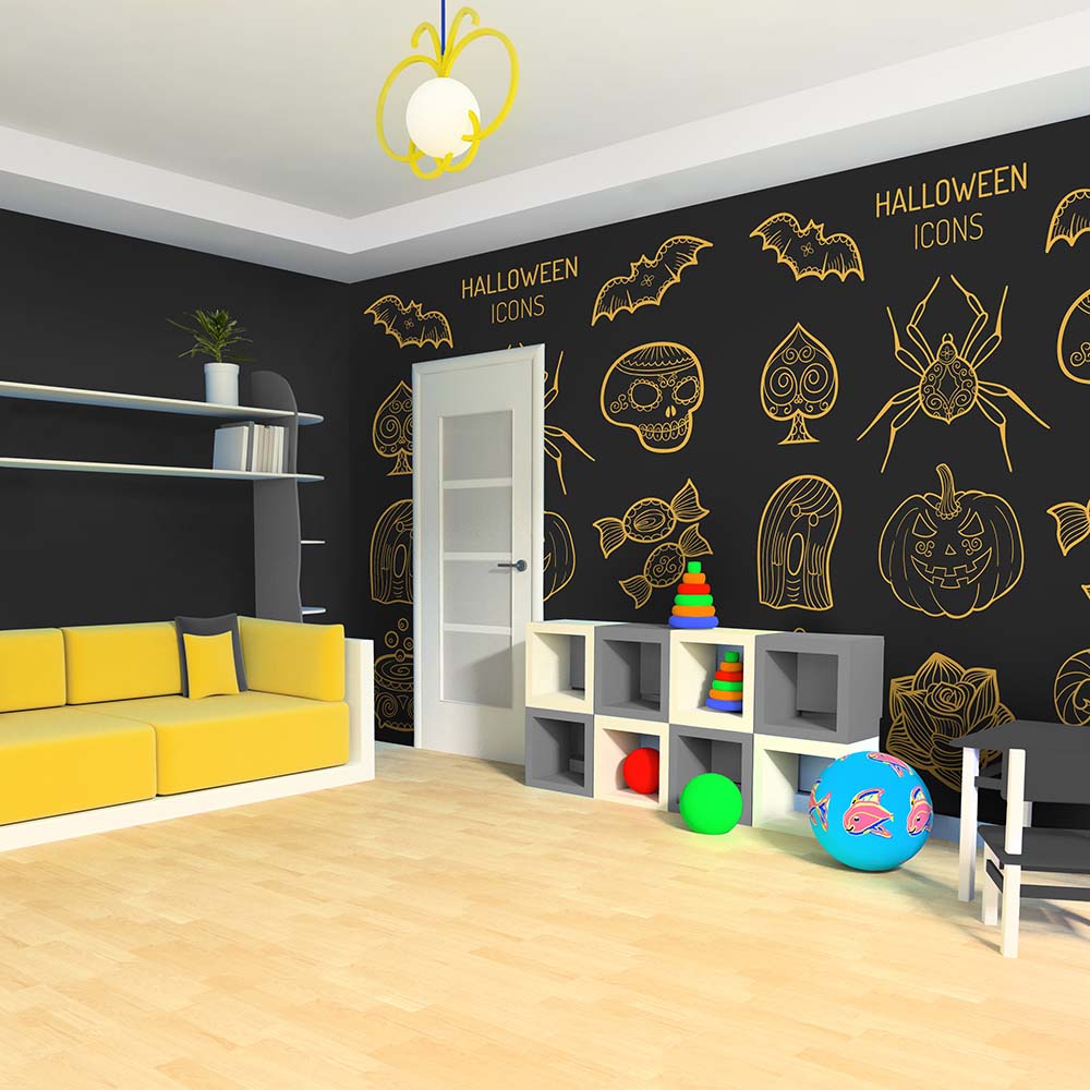 Halloween-themed wallpaper with yellow icons in a playroom.