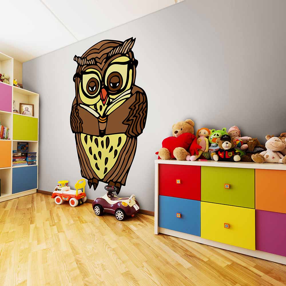 Owl-themed wallpaper in a colorful kids' playroom.