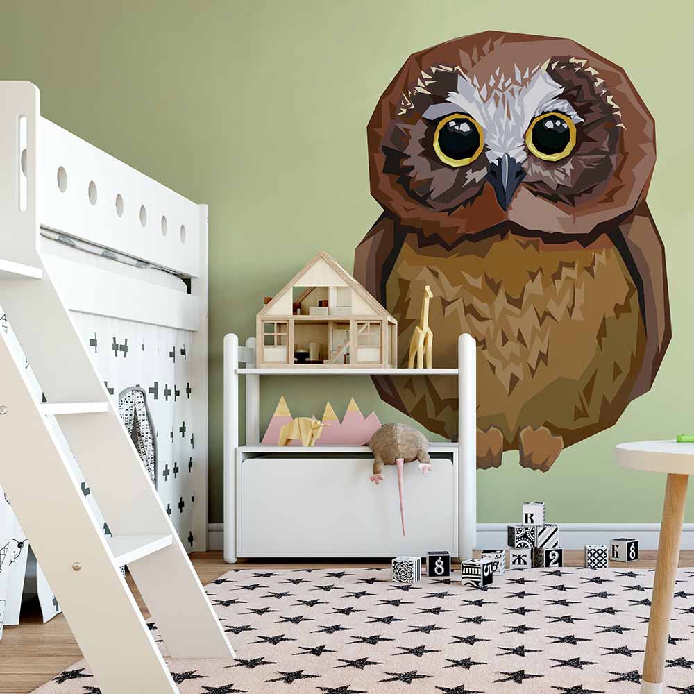 Geometric owl wallpaper in a modern kids' room.