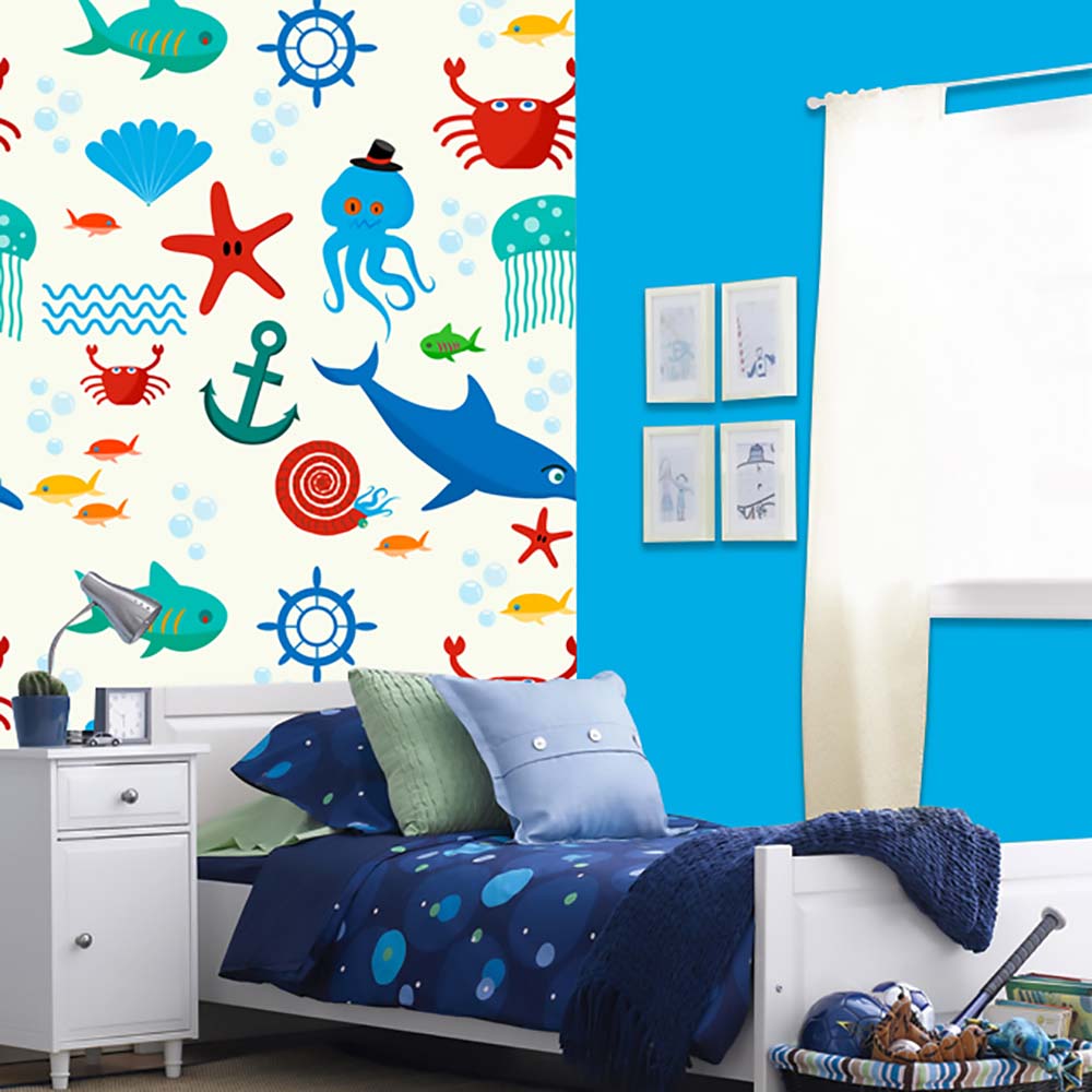 Colorful sea animal wallpaper in a blue for kids' bedroom.