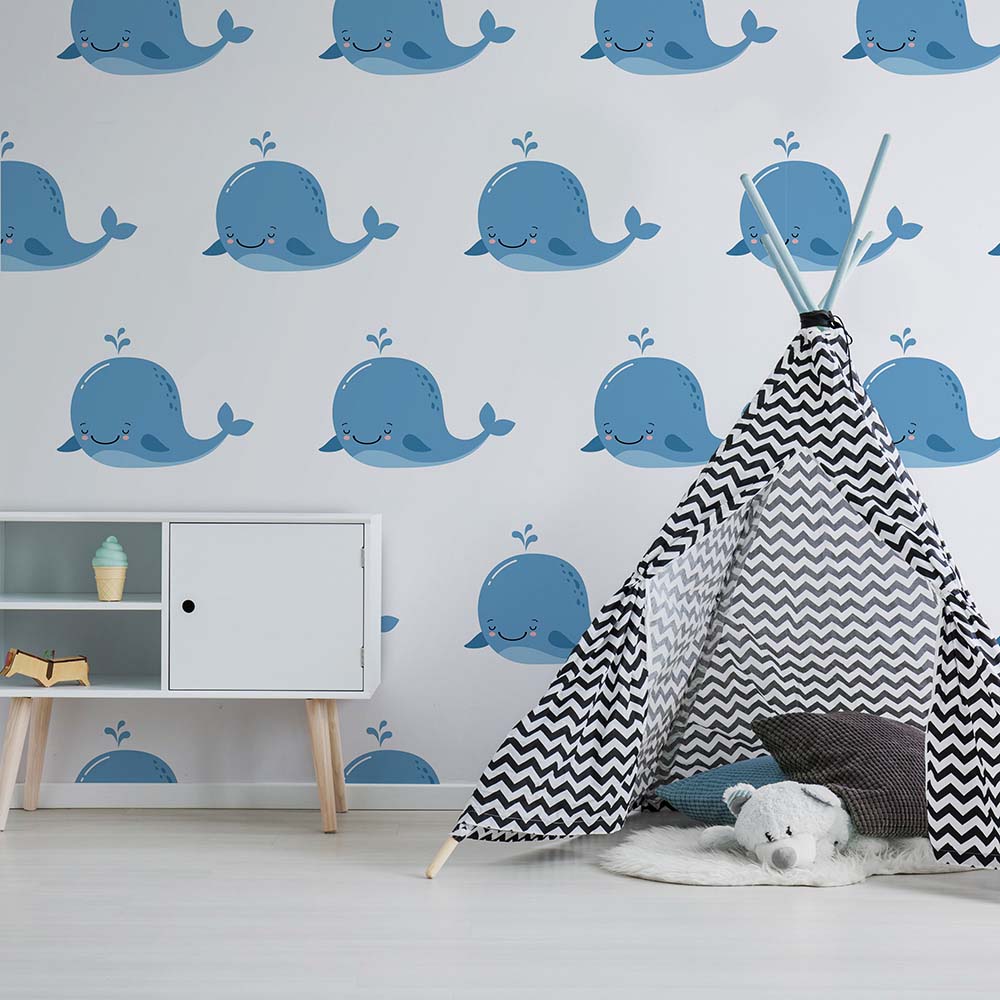 Whale-themed wallpaper featuring playful blue whales.