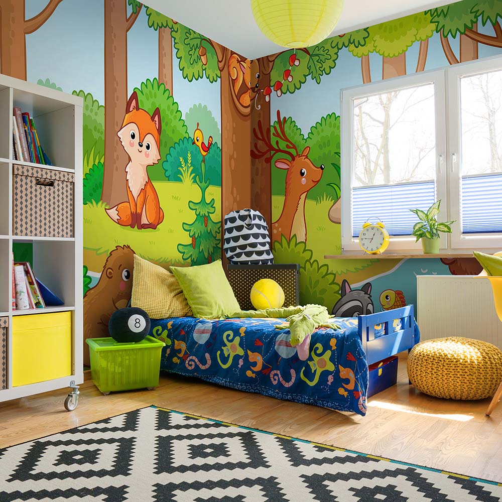 Colorful woodland animal wallpaper for a kids' bedroom.