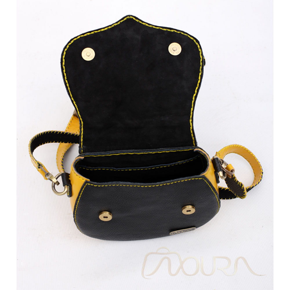 Open black-and-yellow crossbody bag with suede interior.