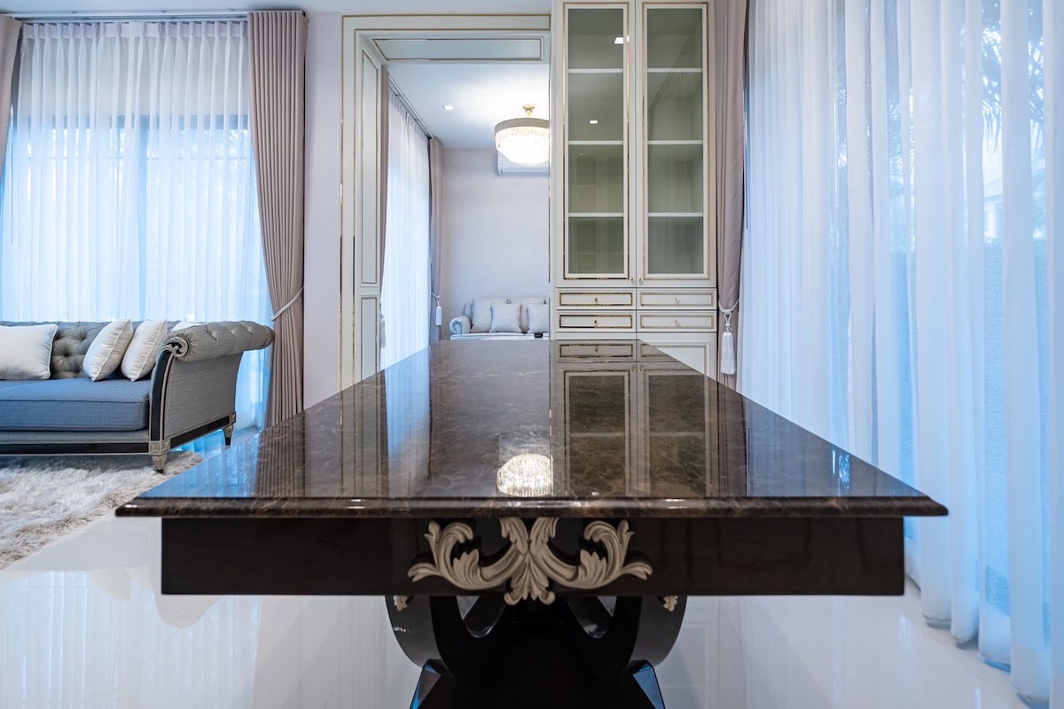 Marble Table Elegance in a Bright, Airy Space.