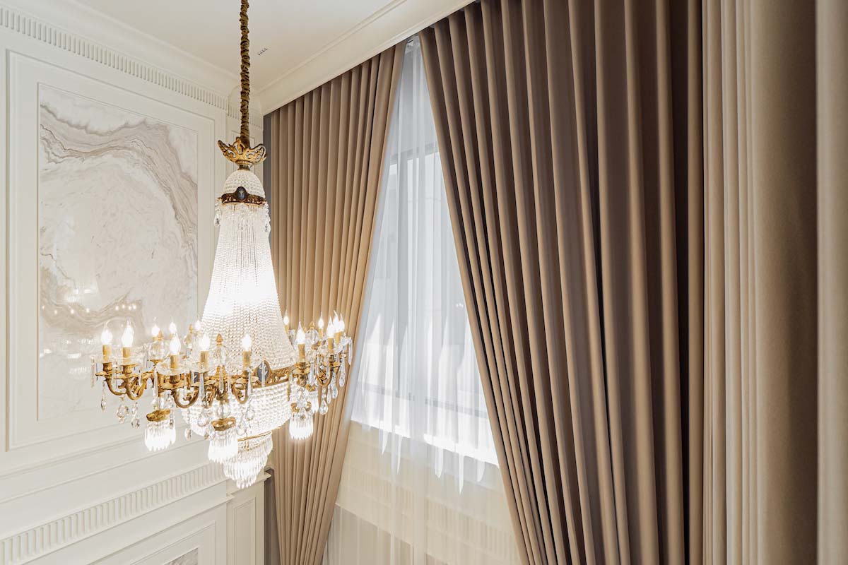 Elegant Drapery and a Regal Chandelier.